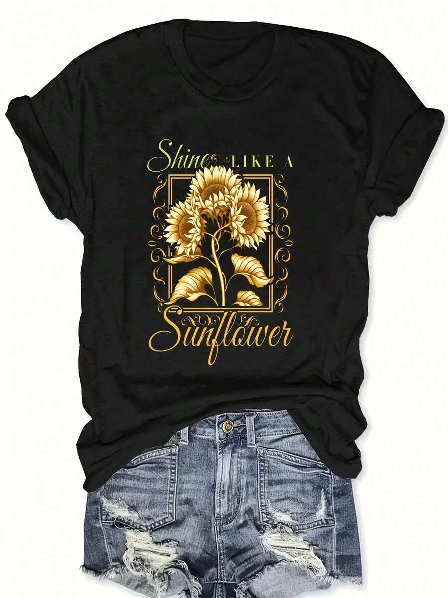 Camiseta Estampada para Mujer - Camiseta Casual Negra de Manga Corta y Cuello Redondo con Diseño de Girasol Dorado y Texto Cursivo - Corte Relajado para Todas las Estaciones, Perfecta para Uso Diario y Vacaciones (Lavable aáquina). - Negro - Ver 1
