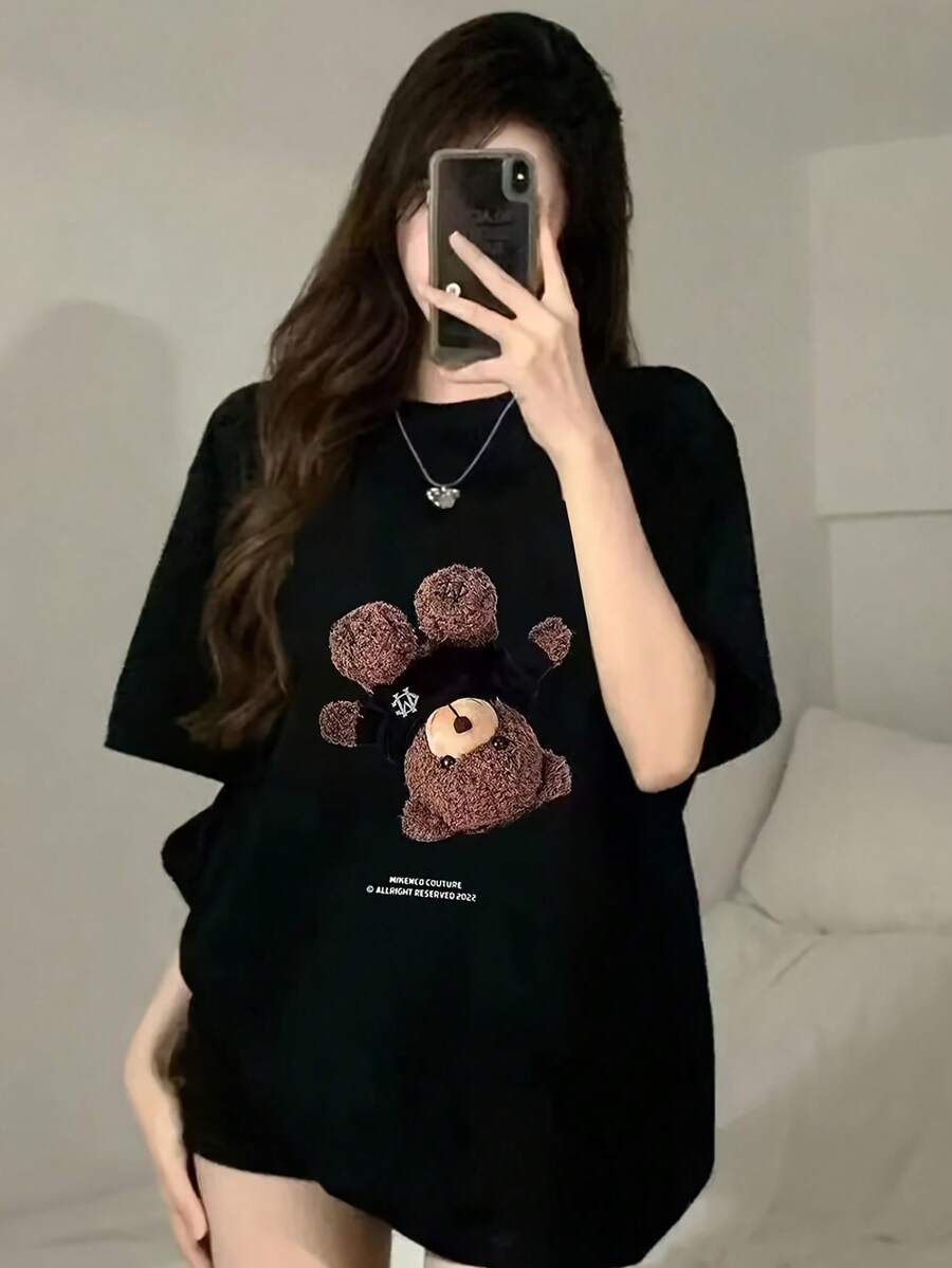 Camiseta de Mujer con Diseño de Oso de Peluche SimpieAndVersatileDesign - Camiseta de cuello redondo, ligera y transpirable, con estampado de oso, agradable al tacto y adecuada como prenda de cobertura, ideal para usar en capas en primavera y verano, lavable a máquina, ropa casual, adecuada para picnics y uso diario. Camiseta de algodón. - Negro - Ver 1