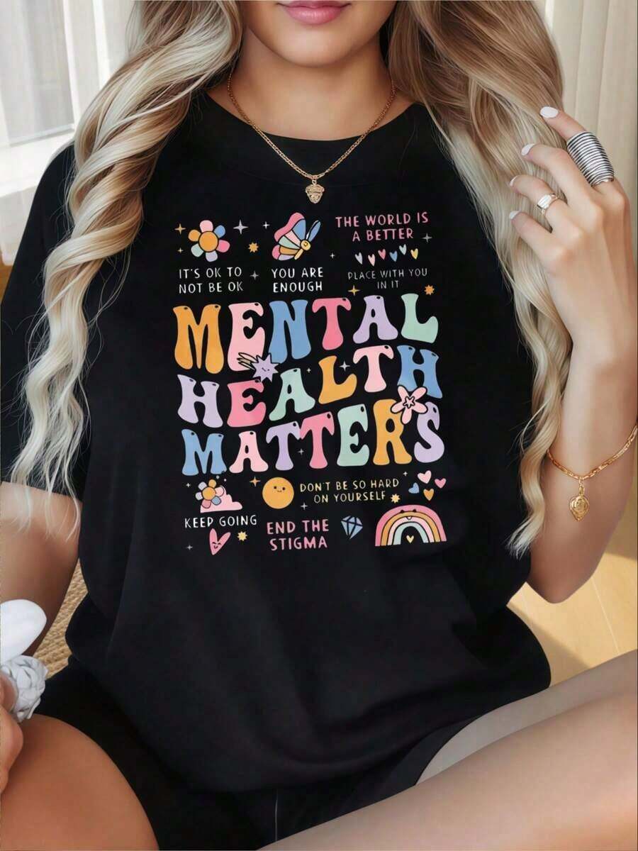Women's T-Shirt With A Round Neck And Short Sleeves, Featuring A Fun Print. This T-Shirt With The Phrase "Mental Health Matters" Is Soft And Comfortable, With Inspirational Quotes And A Colorful Design To Promote Awareness Of Mental Well-Being And Self-Care. Suitable For Valentine's Day, Christmas, Parties, Sports Activities, Holidays, Outings, And Other Festive Occasions. Perfect For Everyday Wear. - 黑色 - 查看 1