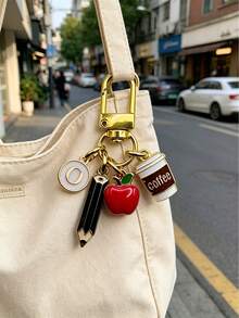 可爱苹果造型钥匙扣，金色字母A-Z，优雅教师包包挂饰，学术风装饰，返校礼物钥匙扣，时尚教师配饰，耐用合金钥匙扣，适用于背包、钱包、手机、耳机、车钥匙，是毕业、教师节、返校、独特生日、节日、派对、毕业礼物的理想之选。 - 彩色 - 查看 6