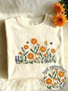 Diseño de bordado de girasol Estampado floral vibrante Camiseta de manga corta de cuello redondo casual para mujer de primavera y verano - Albaricoque 2 - Ver 1