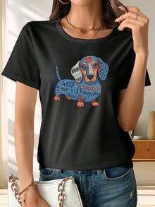 Camiseta Estampada para Mujer - Camiseta Casual de Manga Corta y Cuello Redondo en Negro con Colorido Diseño de Dachshund, Corte Relajado para Todas las Estaciones, Perfecta para el Uso Diario y Atuendos de Vacaciones (Lavable aáquina) - Combínala con Jeans Azules para un Look Casual. - Negro - Ver 1
