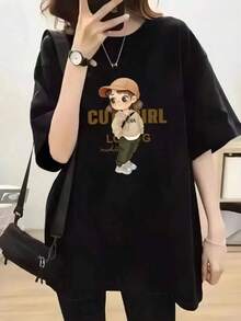 ropa de mujer Primavera/Verano Camiseta de manga corta con cuello redondo simple, holgada, informal, con estampado de texto en inglés y gráfico de chica, color negro, camisas de mujer - Negro - Ver 1