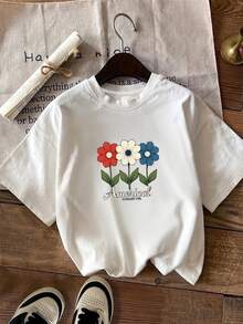 Limited Time Offer, Limited Quantities, Flash ! Women's Casual Shirts, Women's Polyester T-Shirts, Elegant Shirts. Women's Short-Sleeved Crew Neck T-Shirt, Available In Various Colors. Women's Standard T-Shirt With A Three-Flower Floral Print In Red, White, And Blue. - 黑色 - 查看 1