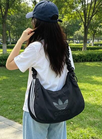 Adidas 阿迪达斯 Originals 女式加大码徽标尼龙云腕带斜挎包 JP0146