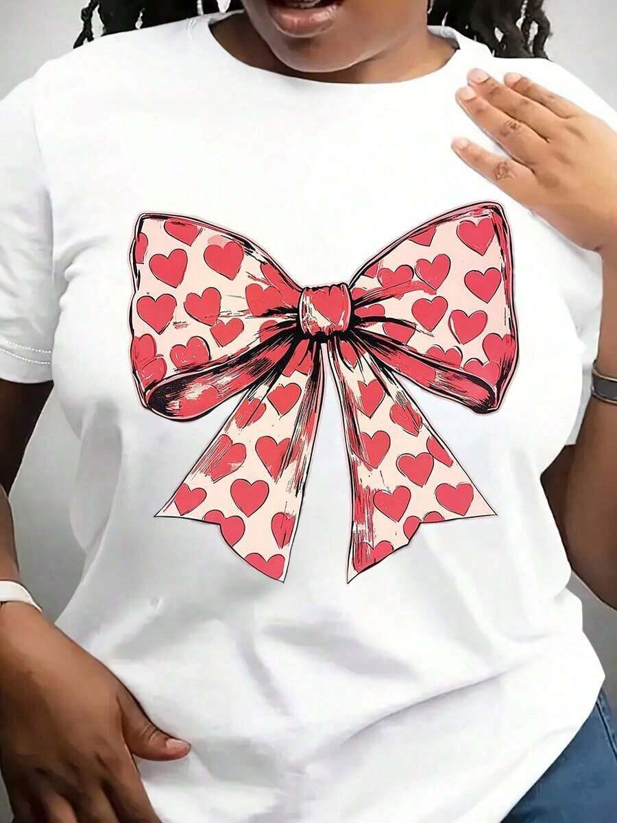 Soft, Breathable, And Lightweight For All-Day Comfort. Valentine's Day T-Shirt With A Heart Bow. Classic Crew Neck With A Relaxed Fit That Flatters All Body Types And Is Easy To Pair With Jeans, Shorts, And Leggings. - 白色 - 查看 1