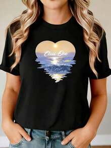 Camiseta casual para mujer, de manga corta y cuello redondo, ideal para la primavera, con un estampado de una escena de playa al atardecer con un corazón. Estampado de primera calidad, refrescante y dulce para el día a día y salidas informales. Ropa elegante para fiestas. - Negro - Ver 1