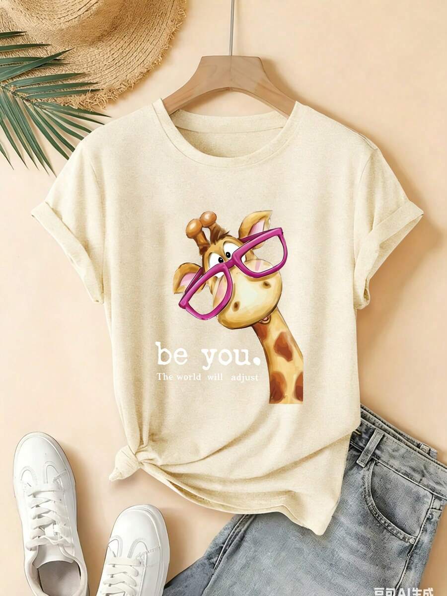 Camiseta de Verano de Alta Gama para Mujer, Camiseta de Manga Corta con Diseño Novedoso, Estilo Deportivo Casual con Cuello Elástico, 100% Algodón, Estampado de Jirafa con Gafas Adorables, Crea Tu Propio Estilo, Top Casual Artístico, Moda Sencilla y , Éxito de . - Albaricoque - Ver 1