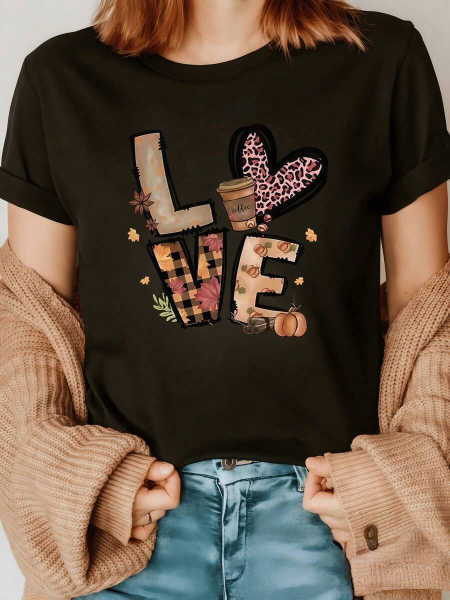 Letras que forman la palabra amor decoradas con hojas otoñales café caliente calabazas y corazón animal print que simbolizan calidez y alegría camiseta de mujer casual moderna cómoda para uso diario - Negro - Ver 1