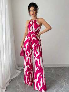 Mono de tela estampada con envolvente frontal para mujer, diseño que define la cintura para usar en ocasiones elegantes, ya sea de fiesta o diario - Rosa Fucsia - Ver 5