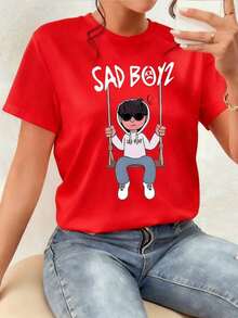 A Young Man Sits On A Swing, His Expression Melancholic, A Broken Red Heart On His Chest Symbolizing Sadness And The Search For Solace In Solitude. This Women's T-Shirt, Made From Soft And Comfortable 100% Pure Cotton, Is Ideal For Creating A Modern Urban Style. Comfortable Clothing. - 紅色 - 查看 7