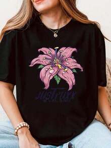 Camiseta de manga corta para mujer con estampado de flores de lirio rosa, corte holgado, informal, para verano, de tela cómoda, perfecta para regalo. - Negro - Ver 1