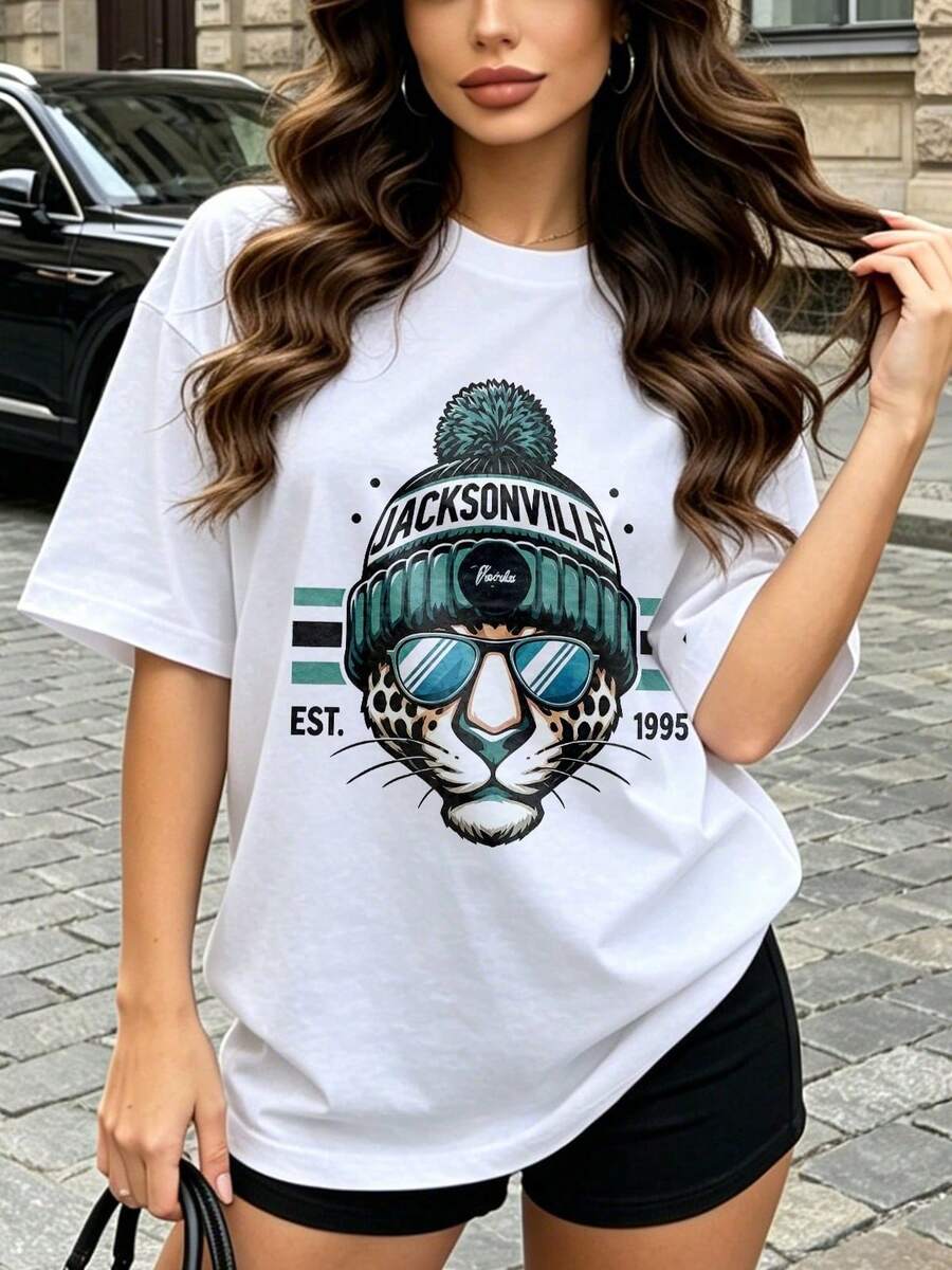 Camiseta de manga corta con cuello redondo suave y casual para mujer, el estampado gráfico de animales de Jacksonville es adecuado para el uso diario en primavera y verano. Blanca. - Negro - Ver 1