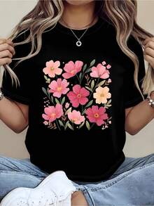 1 camiseta unisex con estampado floral en tonos rosa y melocotón, diseño de cuello redondo, suave y cómoda, una opción ideal para el Día de la Madre. Disponible para entrega local. 180g 100% algodón. - Negro - Ver 1