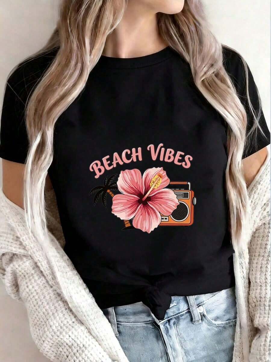 Under The Radar Women's Black Beach-Inspired T-Shirt - Crew Neck Tee With A Pink Hibiscus Flower And Orange-Black Speaker Design. | Casual Summer Top With A Fun Palm Tree Print. | Perfect For Beach Days And Relaxed Outings. | , Lightweight, And Stylish Item - Unisex Loose Cotton Short Sleeve Crew Neck T-Shirt In A Vintage Street Style. - 黑色 - 查看 1