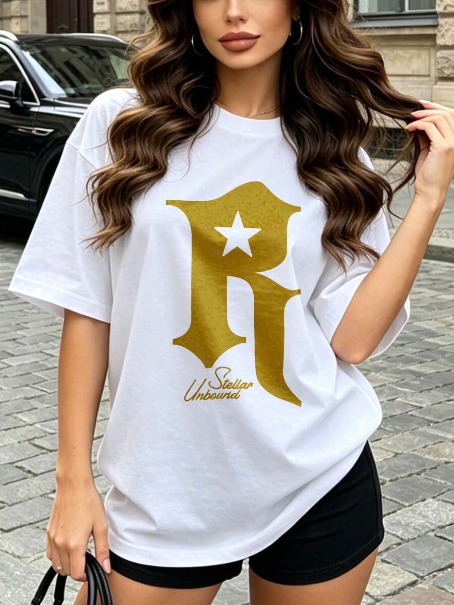 Camiseta de manga corta con cuello redondo suave y casual para mujer, con estampado gráfico de la letra R en forma de estrella, adecuada para uso diario en primavera y verano. Negro. - Blanco - Ver 1