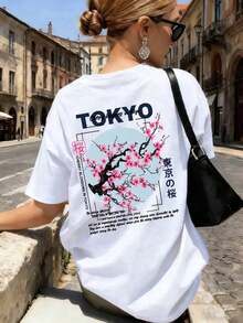 Camiseta de mujer de gran tamaño con estampado gráfico japonés "Flores de Cerezo de Tokio", transpirable y cómoda, de manga corta y cuello redondo, estampado de sakura, de algodón suave, perfecta para uso diario y estilo callejero Harajuku. - Blanco - Ver 2