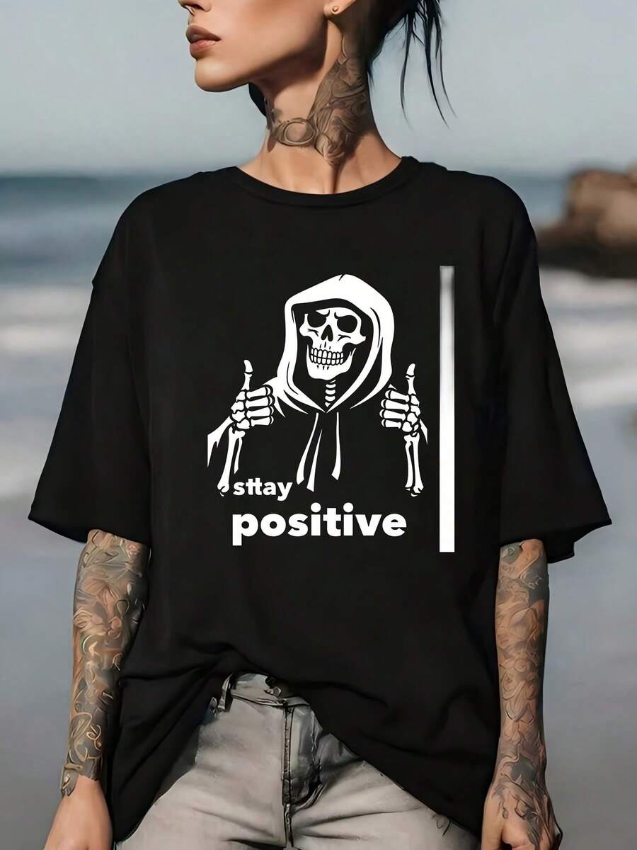 Camiseta Stay Positive Reaper para Hombre y Mujer - Camiseta resistente de 180g con el icónico diseño de la guadaña del rey de la muerte, mangas cortas, cuello redondo, estilo casual, lavable a máquina, adecuada para reuniones familiares, ropa corporativa, vacaciones de verano y uso casual diario. - Negro - Ver 1