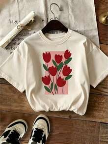 Nueva Camiseta de Moda para Mujer con Cuello Redondo, Estampado Floral en Tonos Rojos, Diseño de Flores Tipo Tulipán con Hojas Verdes sobre Fondo Blanco, Combinado con un Bloque Geométrico en Rosa que Resalta el Contraste, Colores Vibrantes y Equilibrados con un Estilo Ilustrado Moderno, Impresiónérmica de Alta Definición con Detalles Nítidos y Duraderos, para Uso Diario, Trabajo o Salidas Casuales de Verano. Diseño versátil, para el verano. - Negro - Ver 3
