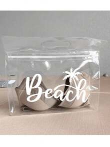 这款透明防水洗漱包印有白色“Beach”字样和棕榈树图案，可收纳洗发水、乳液、化妆品等。时尚实用，适合旅行、通勤、学生和爱美人士使用，可用于旅行、健身、酒店住宿和日常浴室收纳。用途广泛，也可作为化妆包使用。 - 彩色 - 查看 15