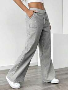 Pantalones sueltos para mujer con rayas azules de tiro bajo para vacaciones y uso informal - Negro - Ver 3