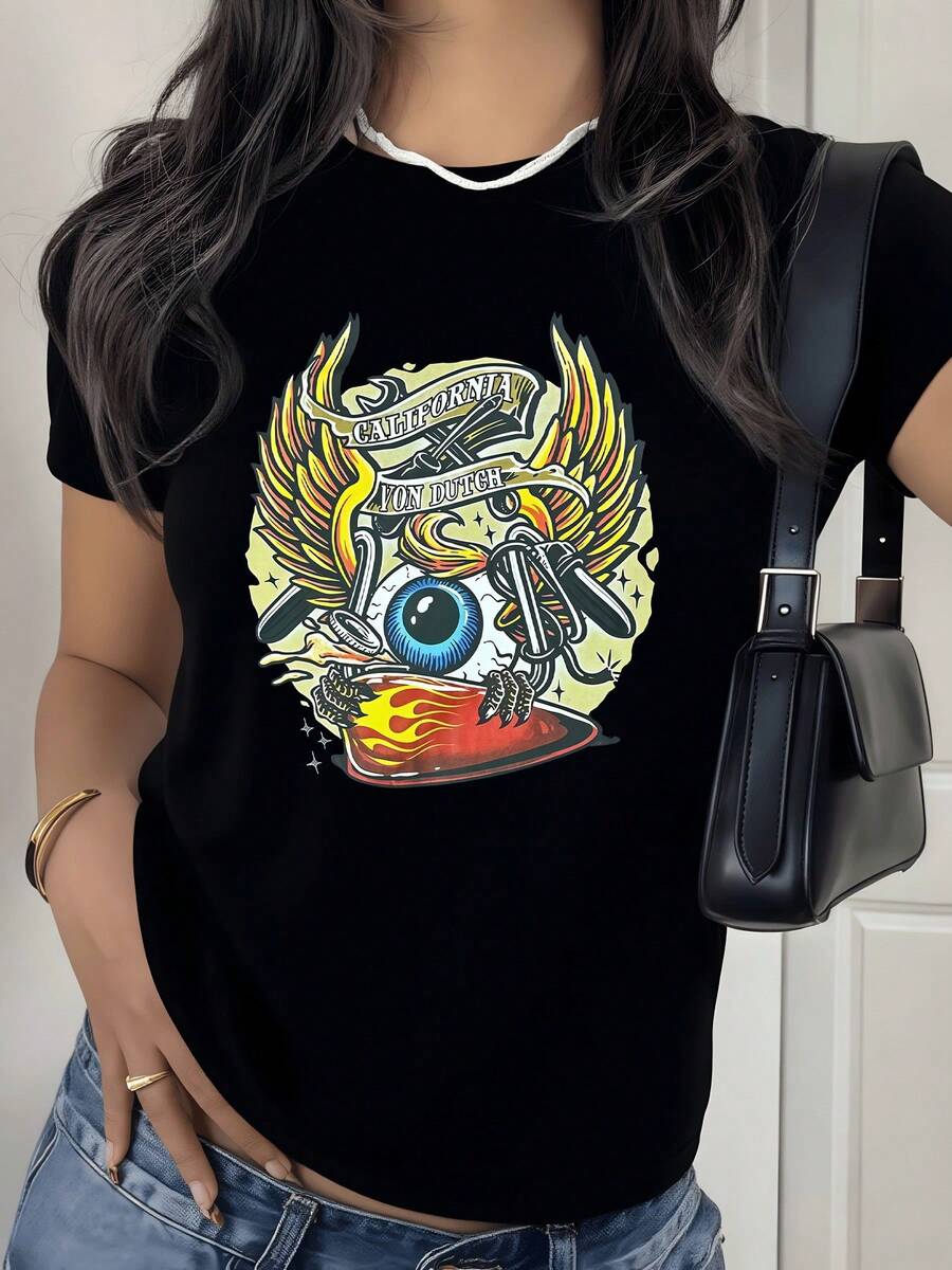 A Blue Eye With Golden Wings Symbolizes Freedom And Inner Perception, Accompanied By Fire Representing Energy And Passion, Along With Tools Evoking Strength And Creativity. A Modern, Casual, Comfortable Women's T-Shirt For Everyday Wear. - 黑色 - 查看 1