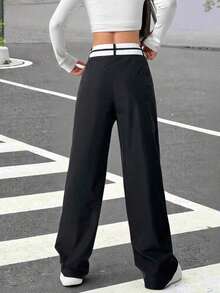 Pantalones rectos casuales para mujeres con bolsillos y cintura asimétrica en bloque de color - Blanco y Negro - Ver 2