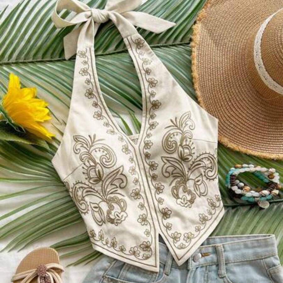 Top corto con escote halter, espalda descubierta y lazo, con bordado floral, adecuado para festivales de música - Beis - Ver 1