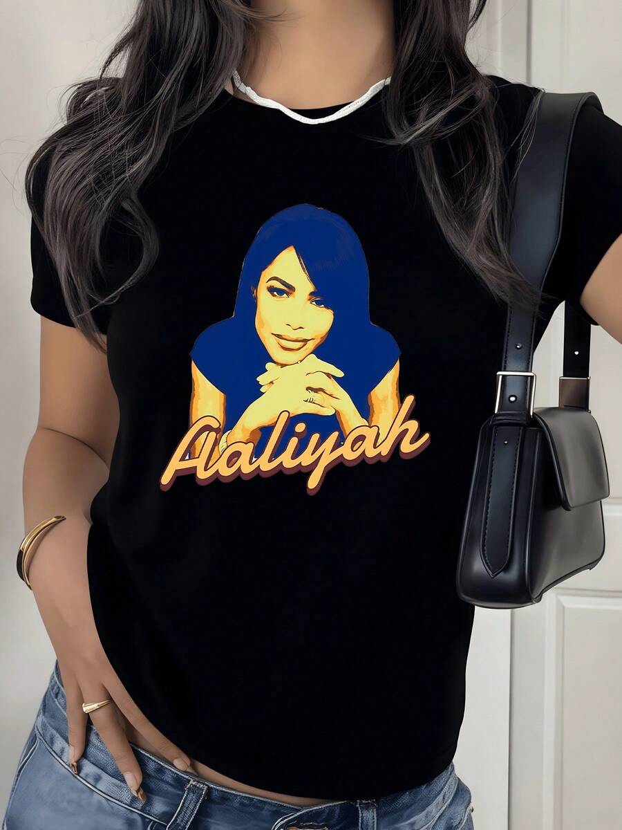 Artistic Figure Of A Woman With Clasped Hands In Shades Of Blue And Gold, Reflecting Calm, Inner Strength, And Elegance. A Modern, Casual Women's T-Shirt For Comfortable And Versatile Everyday Wear. - 黑色 - 查看 1