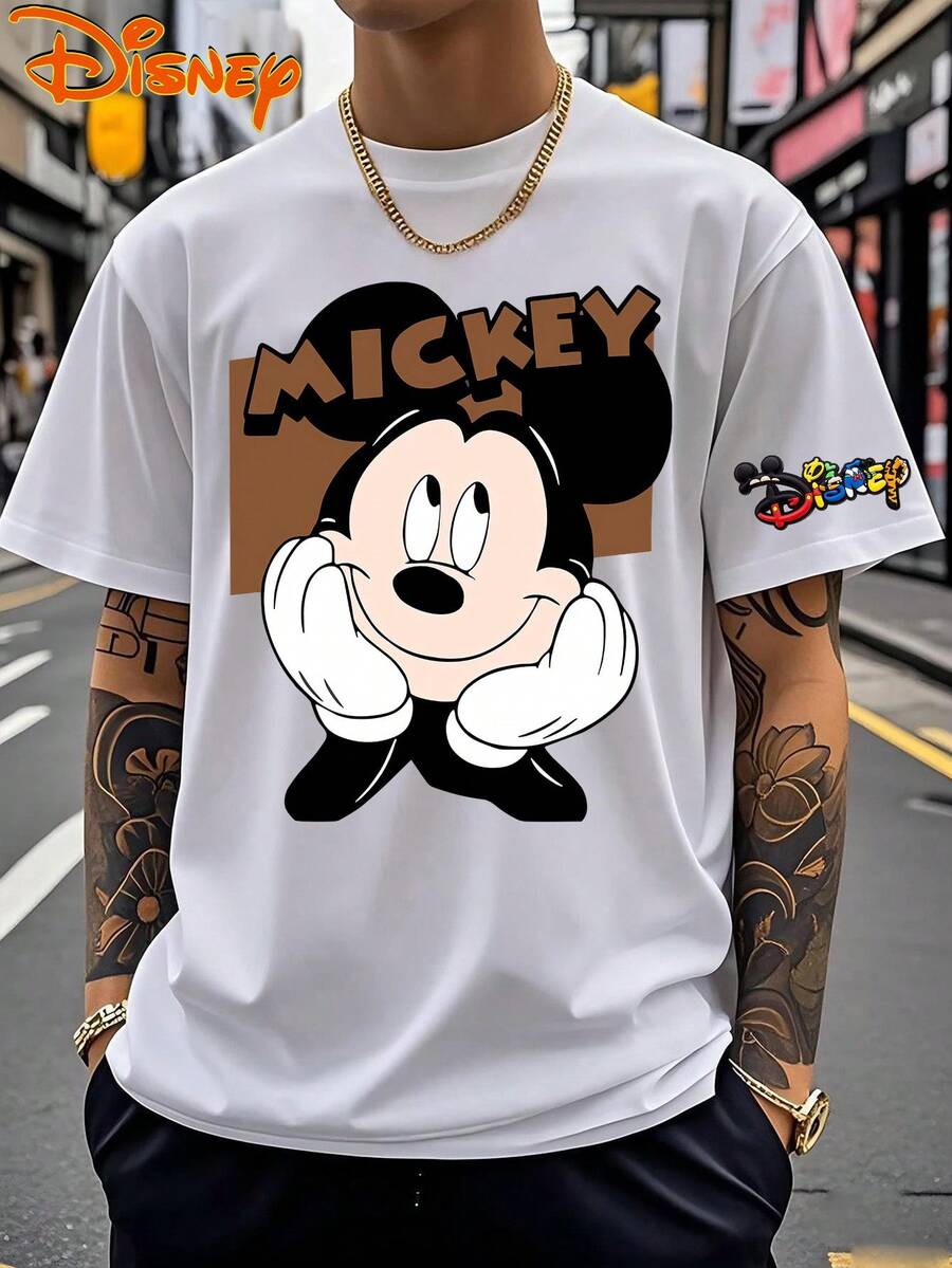 Disney Classic: Mickey Mouse Hand-Loaded Pose Graphic T-Shirt, Warm Brown Color-Block Background Short-Sleeve T-Shirt, White Timeless Crew Neck Casual Top, Distinctive 3D-Style MICKEY Print On The Front, Matching Colorful Disney Logo Sleeve Detail, Soft, Skin-Friendly, Breathable Premium Cotton Material, Durable Seam Construction For Long-Lasting Daily Wear Comfort, Casual Street Vacation Day Outfit, Matching Family Couple Fashion, Iconic Disney Comic Character-Centered Design, Gentle, Cute Visual Style Suitable For Teens And Adults In Daily Scenes, Holiday Gatherings, Casual Activities, And Comfortable Everyday Styling. - trắng - Xem 1