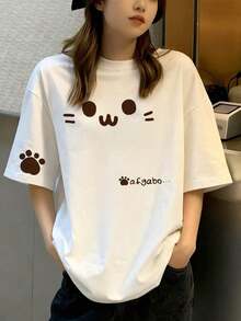 Camiseta de manga corta informal de cuello redondo y corte holgado para mujer, estilo japonés, con estampado de gato de dibujos animados y letras, color blanco, para primavera y verano. - Blanco - Ver 3