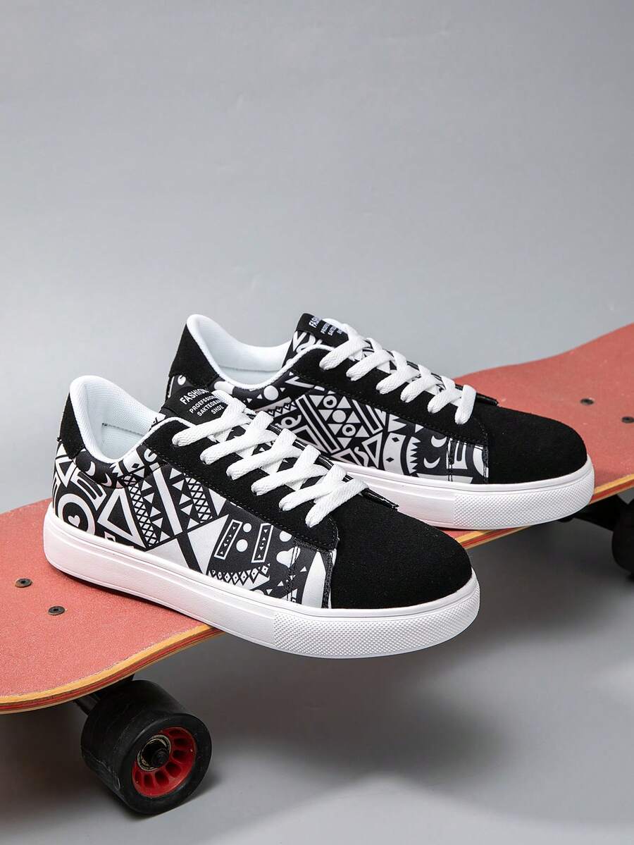 Zapatos de lona con estampado de graffiti aleatorio en blanco y negro, de estilo clásico y unisex, zapatillas de skate ligeras y casuales para todas las estaciones
