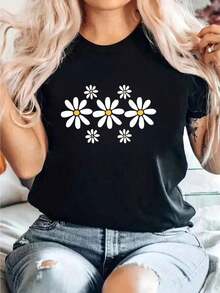 Camiseta de manga corta para mujer, transpirable, con estampado floral de margaritas negras - Corte relajado, cuello redondo, top casual, tela transpirable de elasticidad media, disponible en tallas grandes, lavable, para primavera, verano y otoño, ropa de vacaciones, estilo simple y elegante, material no transparente, playeras de mujer algodón,  mujer premium. - Negro - Ver 1