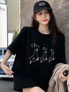 Camiseta de manga corta estilo japonés para mujer, holgada, con cuello redondo, estampado de pato de dibujos animados, informal, para primavera/verano, negra. - Blanco - Ver 10