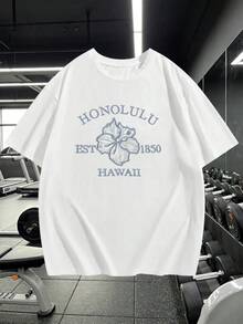 Flor tropical de hibisco con texto HONOLULU HAWAII evocando el espíritu relajado y la historia isleña desde 1850 Camiseta de hombre 100% algodón suave y cómoda para uso diario - Negro - Ver 6