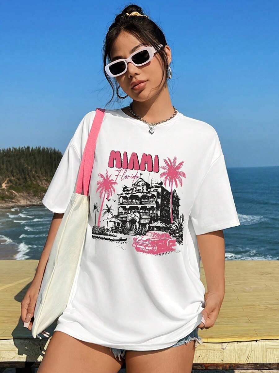 Nueva camiseta blanca de manga corta, corte holgado y cuello redondo para mujer, estilo primavera/verano, con estampado de letras y cocoteros, adecuada para mujeres, top de moda casual y versátil, perfecta para atuendos informales. Alta calidad. - Blanco - Ver 1