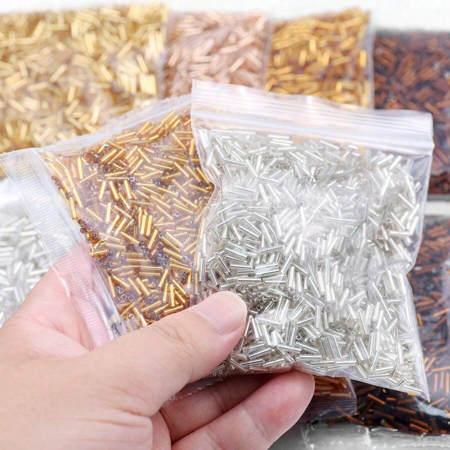 1/3 túi hạt cườm thủy tinh hình ống 4x1/6x1mm, màu vàng và bạc, dùng để làm đồ trang sức thủ công, thêu, vòng tay, vòng cổ, bông tai.