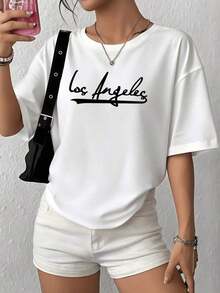 100% Cotton. The Word On The T-Shirt Symbolizes The Creative Energy And Free Spirit Of A City Full Of Dreams And Constant Movement. Women's T-Shirt, 100% Soft Cotton, Comfortable And Modern Cut For Everyday Wear. Women's Simple Solid Color T-Shirt, Loose And Slim Fit Casual Short Sleeve - 白色的 - 查看 1