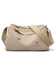 1 buah Tas Selempang Kasual Serbaguna Kapasitas Besar Multi-Kompartemen Bahan Nylon Warna Polos dengan Penutup Resleting, Cocok untuk Wanita Saat Bepergian, Berkumpul, Berbelanja, dan Berwisata - Krem - View 1