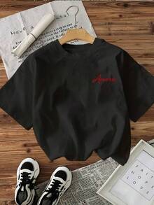 2026 new Camisetas Para Mujer Camiseta Unisex Y2K con estampado minimalista "Amore" en color negro, perfecta para destacar tu estilo único y moderno, ideal para complementar cualquier outfit, disponible en talla única, atrévete a lucir lo mejor de la moda contemporánea - Negro - Ver 1