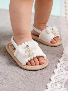 Giày sandal mùa hè cho bé gái sơ sinh, đế mềm, có nơ hoa, thích hợp cho đám cưới hoặc tập đi, giày tập đi cho bé từ 3-18 tháng tuổi. - trắng - Xem 7