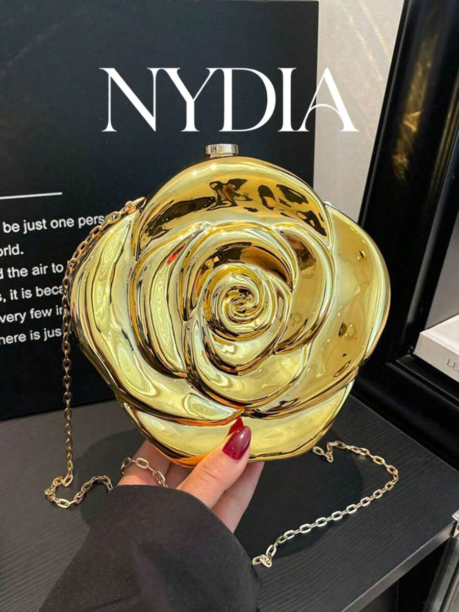 1个金色玫瑰造型手拿包，时尚金属质感晚宴手拿包，奢华手提包，适合女士婚礼、派对、晚宴等场合。
