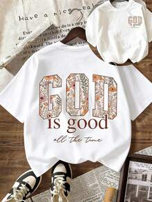 Women's Short-Sleeved T-Shirt With A Double Print (Front And Back) Of The Slogan "GOD Is Good All", With The Letters Filled With Vintage Floral Motifs. It Conveys A Tender And Comforting Feeling. A Retro American Style That Enhances Natural Elegance In Any Everyday Look. - 黑色 - 查看 1