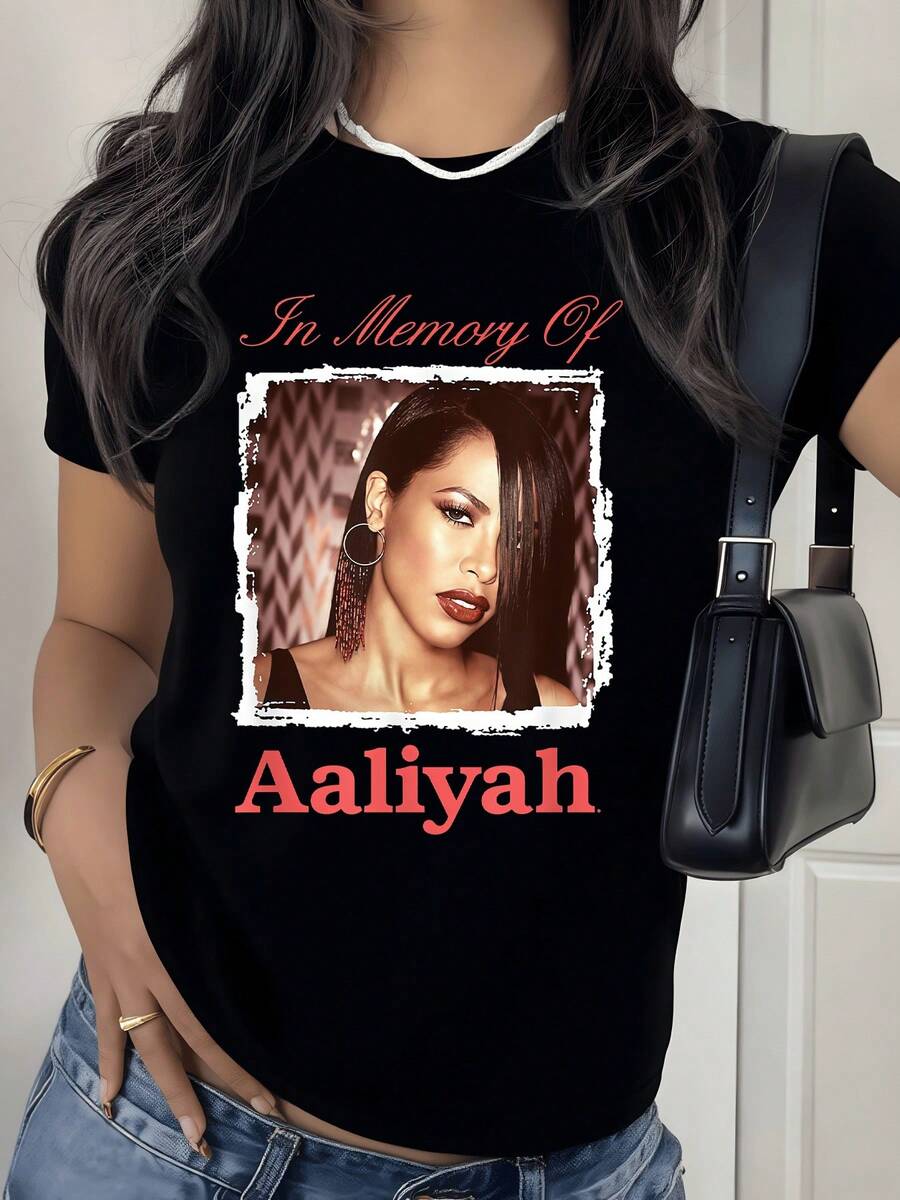 Recuerdo artístico con letras rojas y fondo oscuro que expresa homenaje y nostalgia transmitiendo fuerza interior y elegancia moderna camiseta de mujer casual cómoda para uso diario - Negro - Ver 1