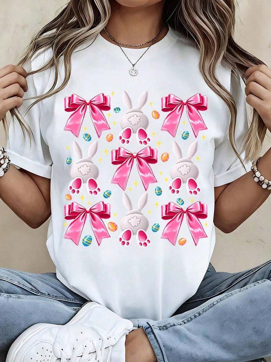 Nueva Camiseta de Moda para Mujer con Cuello Redondo, Estilo Casual, con Estampado de Conejo de Pascua con Lazo Rosa y Huevos, Manga Corta, para Primavera y Verano. Diseño versátil y listo para el verano. - Blanco - Ver 1