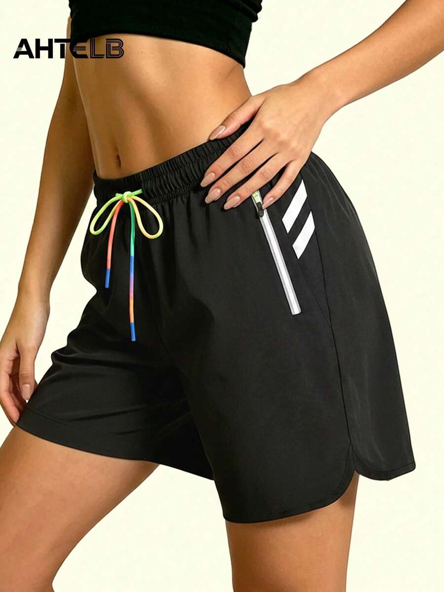 Quần short thể thao nữ AHTELB nhiều màu dây rút có túi khóa kéo chống trộm, chất lụa băng thoáng khí co giãn nhanh khô đa năng cho yoga fitness, phù hợp tập gym, chạy bộ, yoga và thời trang thường ngày mùa hè với sọc phản quang bên hông, quần short gym, gym, mùa hè, quần short đạp xe nữ, quần short chạy bộ, đồ tập gym nữ - màu đen - Xem 1