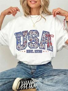Women's 100% Cotton T-Shirt With Floral Bow Graphic Print, Soft USA EST 1776, Aesthetic Patriotic Flirty Top, Y2K Style For The 4th Of July, Soft And Breathable Summer Clothes, Urban Casual Wear, Unique Gift For Her. - 白色 - 查看 1