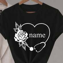 Camiseta con estetoscopio de corazón de rosa con nombre personalizado | Cuello redondo de verano, tejido ligeramente elástico, ideal para mujeres y - Negro - Ver 2
