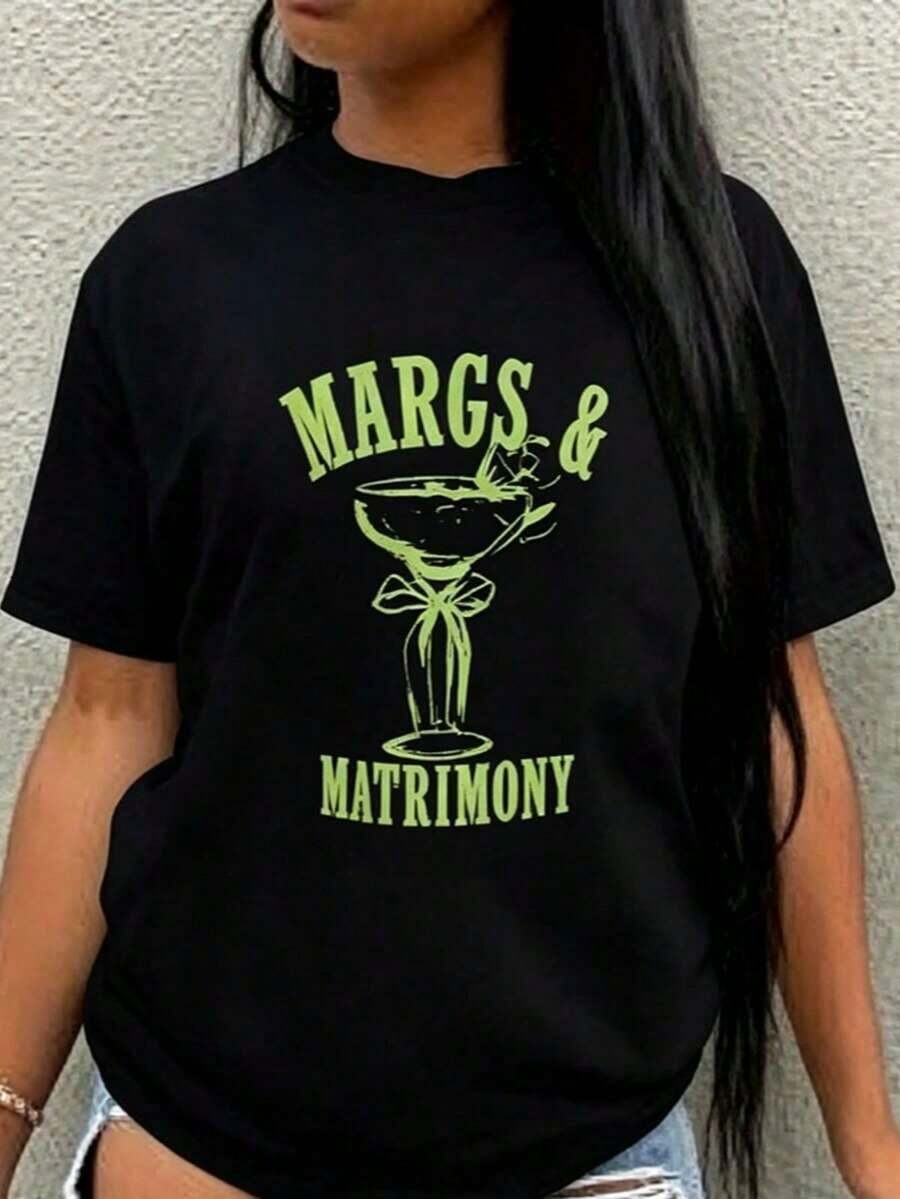 Camiseta Blanca 100% Algodón para Mujer con Divertido Estampado de Margaret y Matrimonio | Camiseta negra con diseño de copa de margarita verde - Corte holgado, adecuada para fiestas informales como despedidas de soltero, bodas y noches de margarita - Lavable a máquina, adecuada para primavera y verano, manga corta 2026 - Ropa de verano para mujer, blusas estilo Y2k para mujer, ropa casual para mujer. - Negro - Ver 1