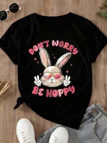 PremiumEaster Women's Plus Size T-Shirt With Cute Bunny Print, Heart, And Peace Symbols, Featuring The Phrase 'Don't Worry Be Hoppy'. This Short-Sleeved Graphic Tee Is Perfect For Everyday Wear, Hunting, And Spring. It's A Festive Top, Ideal For Summer Outfits And Casual Summer Wear. The Breathable,  Design Includes A Round Neck, Loose Fit, And Is Made With  Fabric. - 黑色 - 查看 2